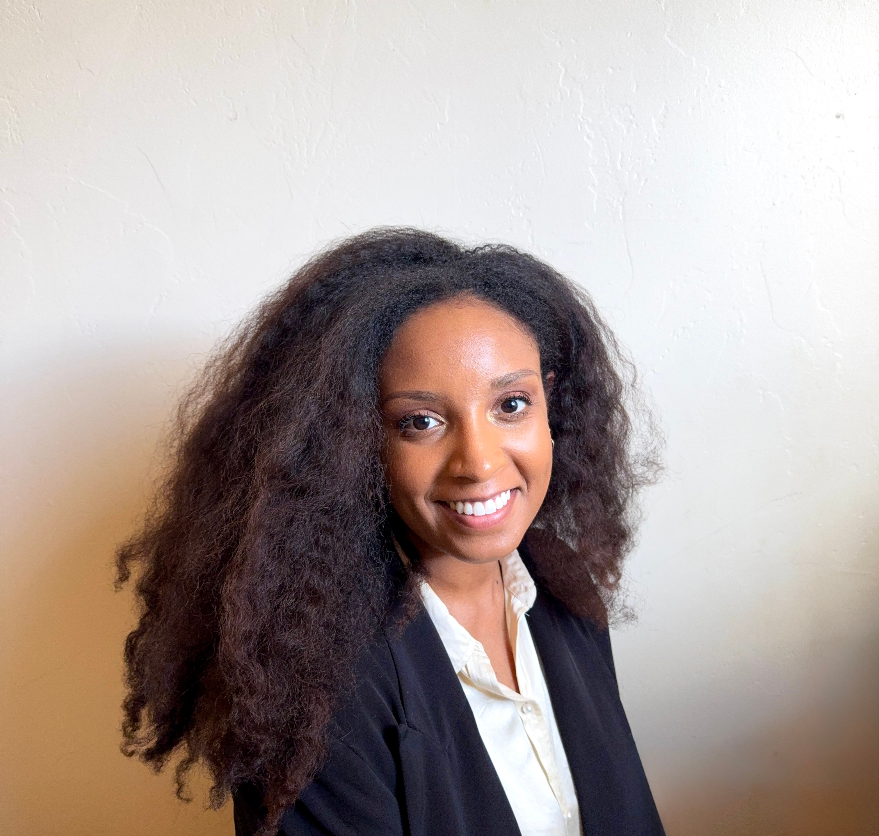 Professional headshot of Sydni Fomas Do